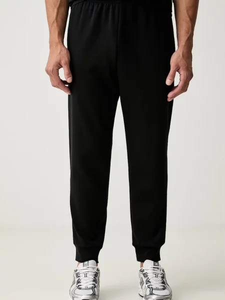 The North Face pantaloni de trening pentru bărbați cu Evolution negru