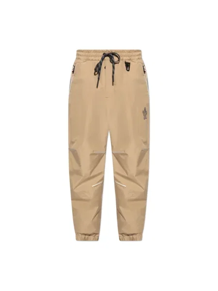 Spodnie Moncler beżowe