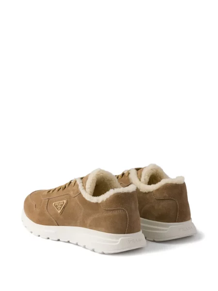 Sneakerși Prada din piele de căprioară