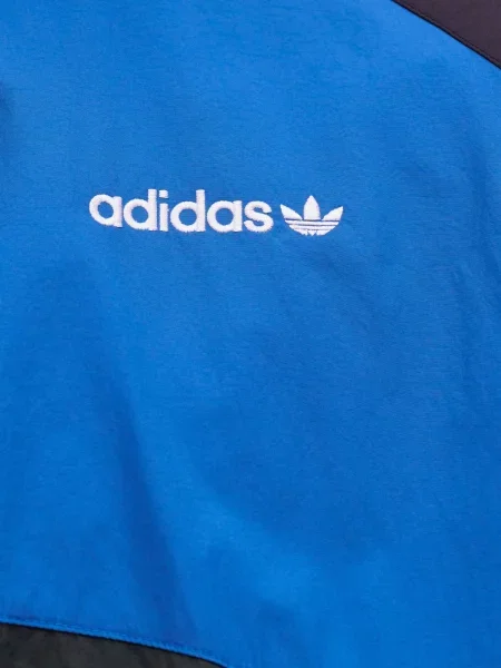 ADIDAS ORIGINALS Prechodná bunda Munich kráľovská modrá / čierna biela