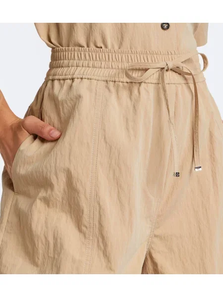 Pantaloni Ganni cu volane bej