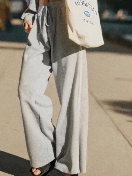 Спортивні штани з широкими штанинами та лампасами сірий