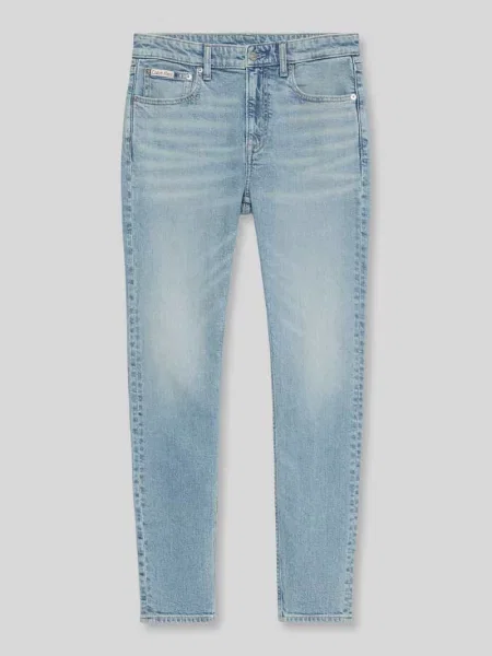 Jeansy o kroju tapered fit z czystej bawełny Calvin Klein Jeans