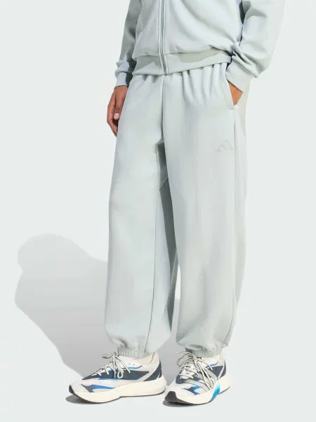 Переработанный джоггеры Adidas зеленые