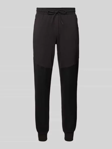 Spodnie dresowe o kroju regular fit z detalem z logo Puma Performance czarne