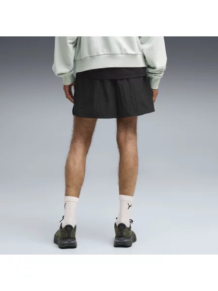 PUMA szorty z tkaniny Run Culture Collective T7 o luźnym kroju Odzież S czarny