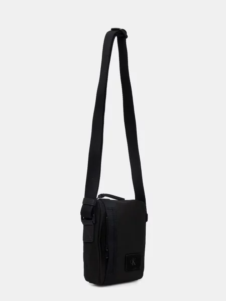 Calvin Klein Ľadvinka Canvas Mix Reporter čierna