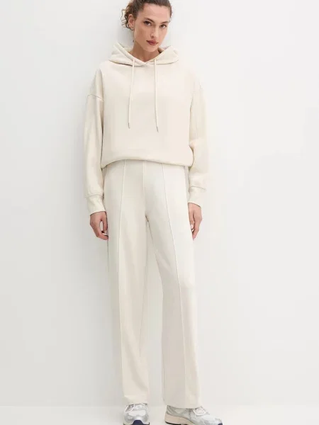 Однотонные спортивные штаны Puma бежевые