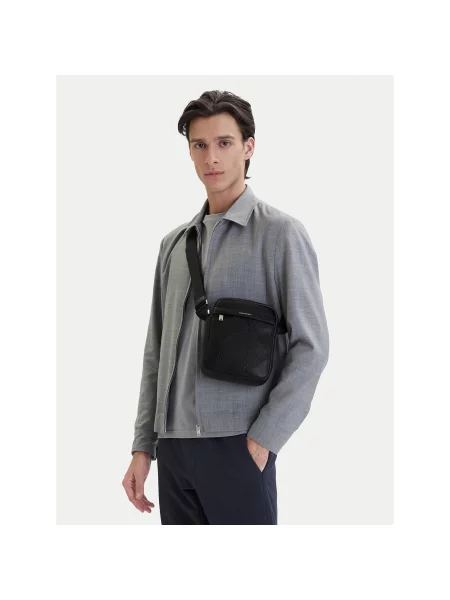 Мъжка чантичка Calvin Klein Emblem Aop Emboss Reporter черен