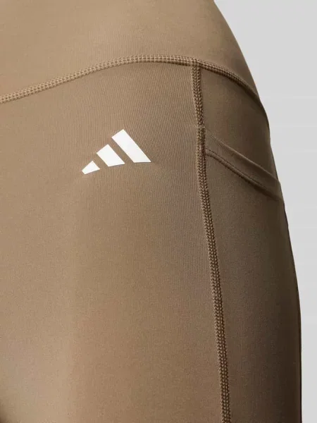 Obcisłe legginsy sportowe z nadruk z logo Adidas Training