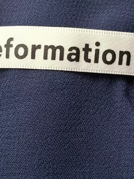 Gėlėta raštuota midi suknelė Reformation iki kelių mėlyna