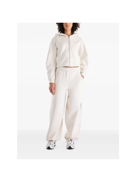 Spodnie dresowe New Balance polarowe beżowe
