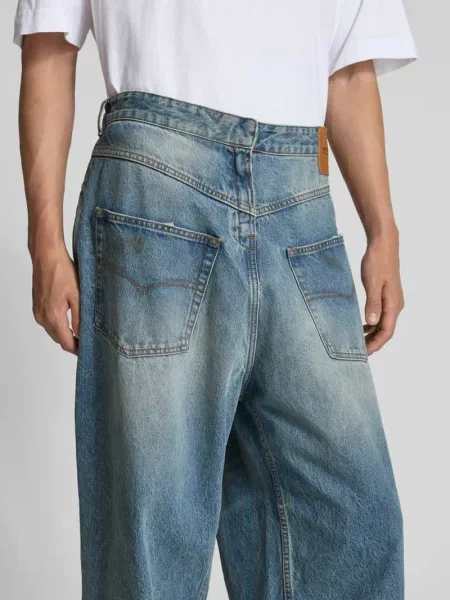 Jeansy o kroju loose fit z bawełny Vetements