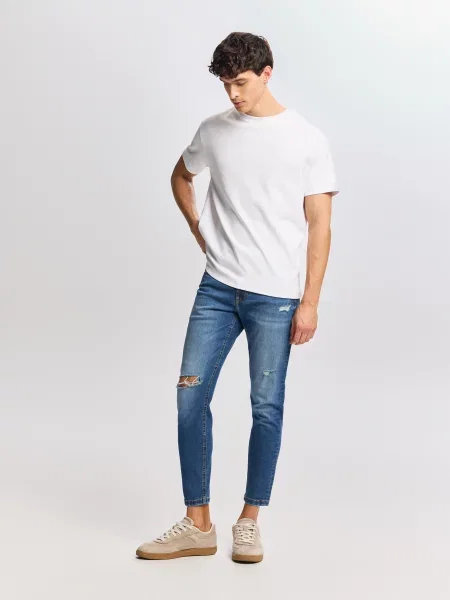 Reserved Джинси skinny з потертостями синій