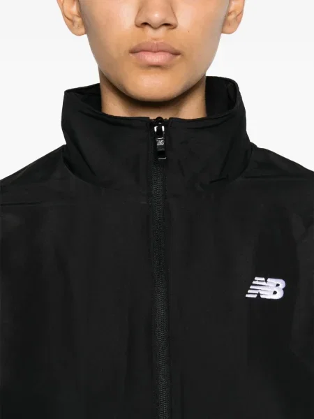 Тениска New Balance от джърси черно