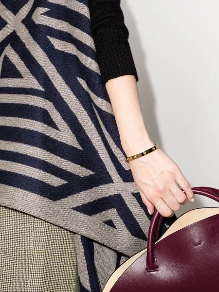 Apyranke Tory Burch auksinė
