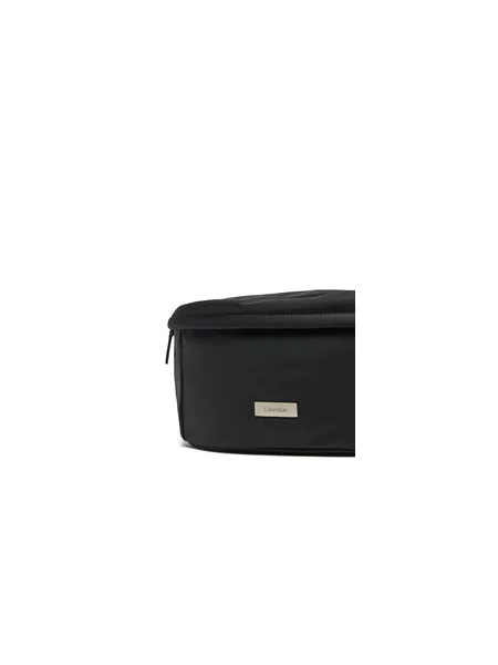 Calvin Klein Torbica za okrog pasu﻿ Sleek Waistbag Sling črna
