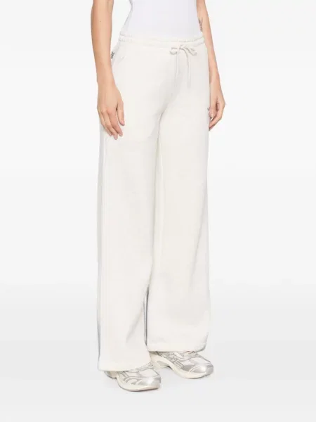 Decupat pantaloni New Balance cu imagine alergare