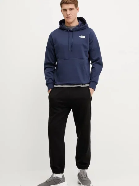 Pulover The North Face Simple Dome mornarsko s kapuco modra