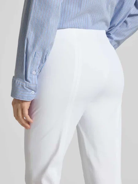 Wąskie spodnie typu pull-on z techno-bawełny superstretch Raffaello Rossi białe