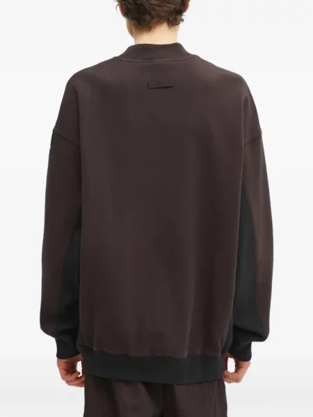 Sneakersy Adidas Predator w paski z dekoltem w serek z kapturem różowe