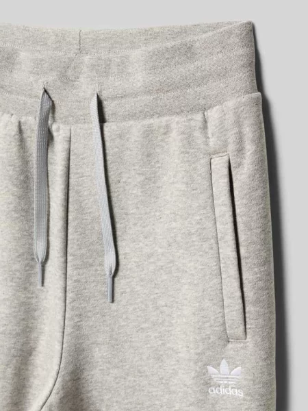Spodnie dresowe o kroju regular fit z mieszanki bawełny Adidas Originals