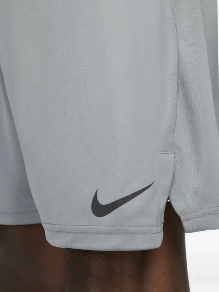 Krátké fleecové kraťasy Nike s potiskem žluté