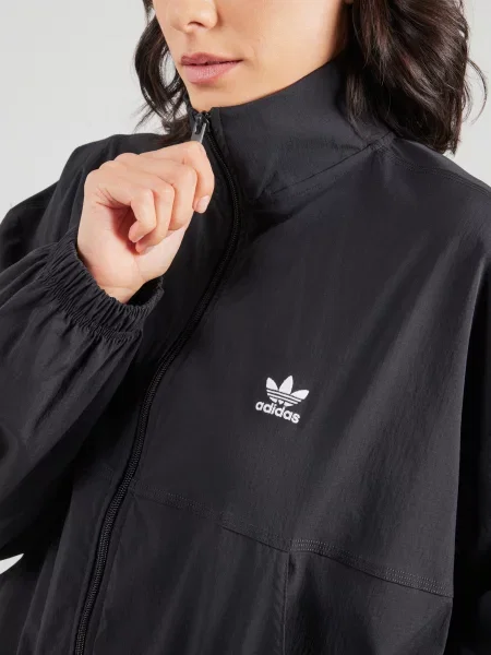 ADIDAS ORIGINALS Prehodna jakna ESS WB' črna