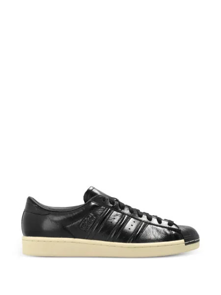 Trčanje natikače Adidas s vezom s paisley uzorkom crna